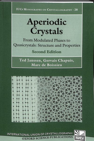 Aperiodic crystals: from modulated phases to quasicrystals